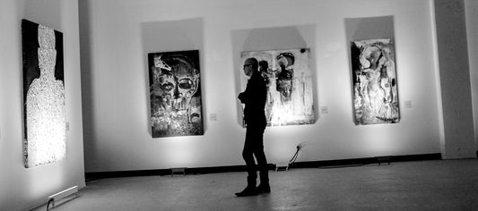2014 Exhibition Pax Aetherna. Man observing painting in the gallery